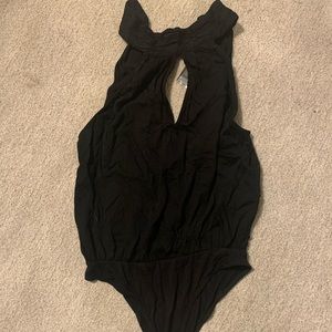 Still has tags! Body suit